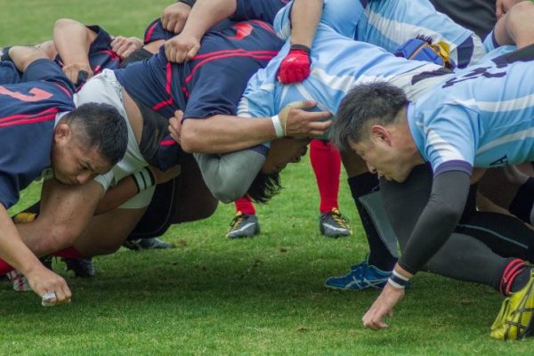 rugby players form a scrum